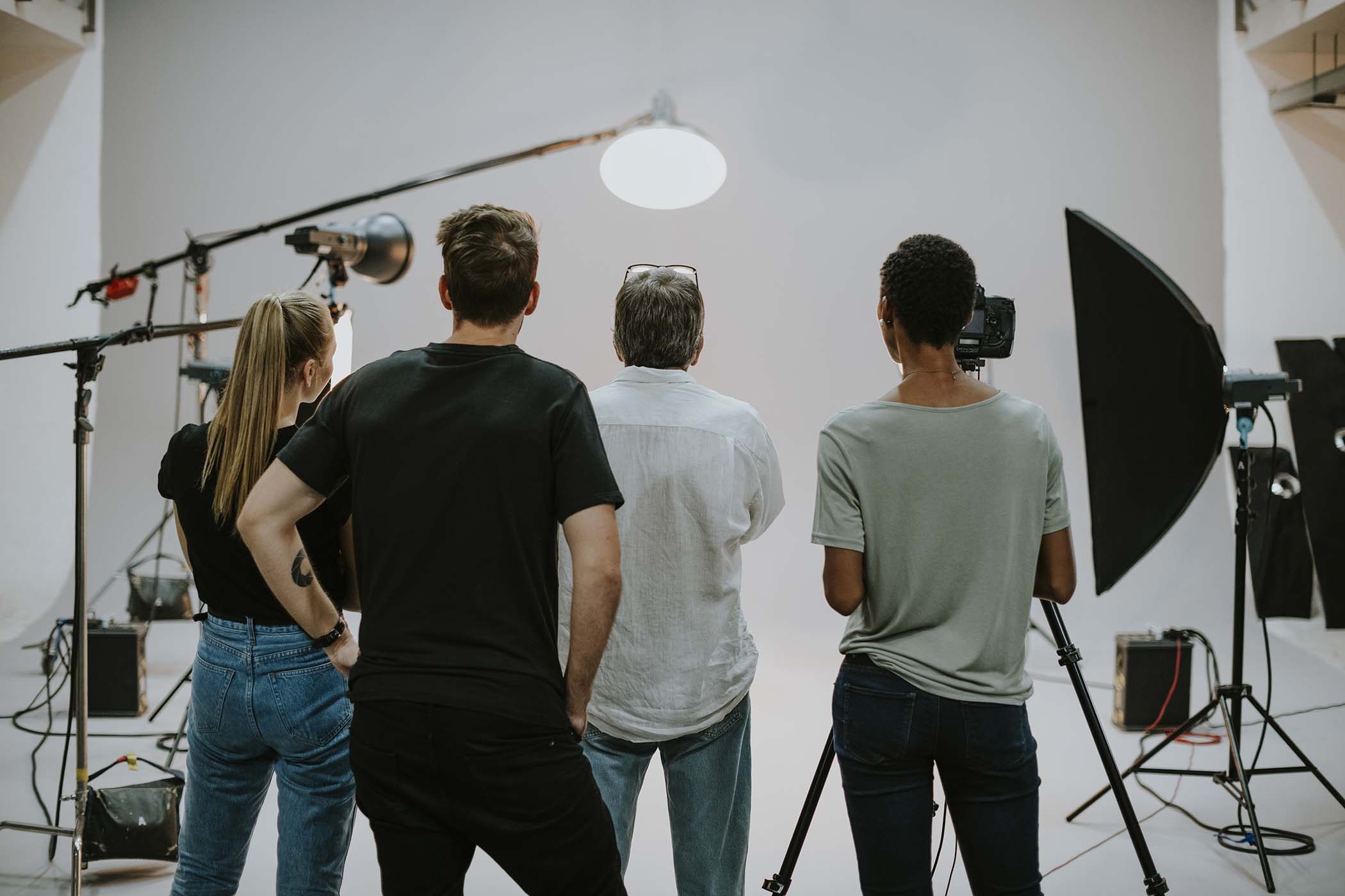 production-team-working-together-in-a-studio-G6LDVJW.jpg